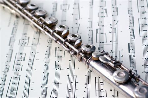 A Flute On Sheet Music Stock Image Image Of Flute Sound 2373579
