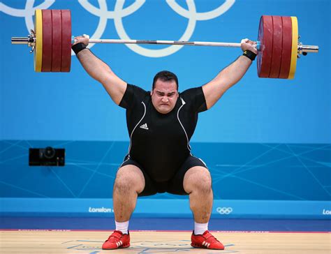 Iranian Weight Lifter Wins Gold In Mens Super Heavyweight Division The New York Times