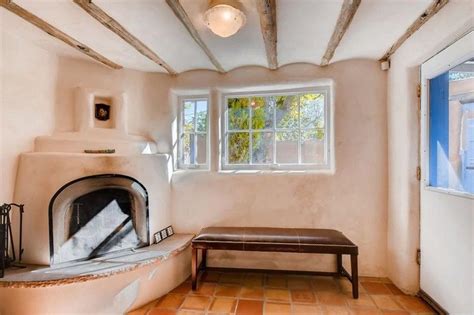 Maybe you would like to learn more about one of these? Pueblo-style adobe home in Santa Fe—ceiling beams and ...