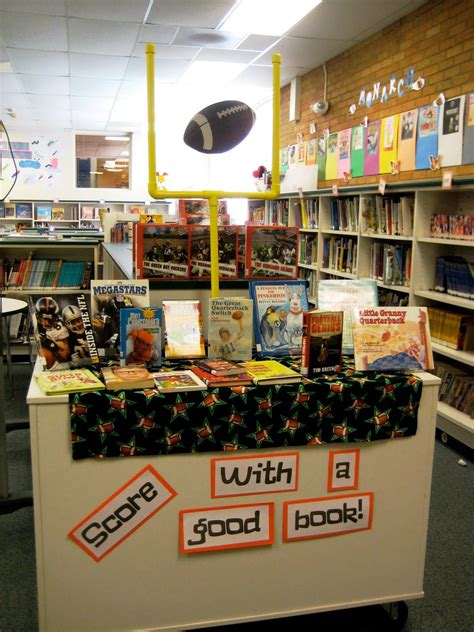 Library Displays: Score with a Good Book | School library displays, Library book displays ...