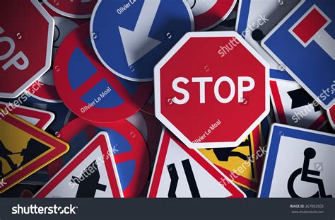 Front View Of Numerous French Traffic Road Signs Concept Image For