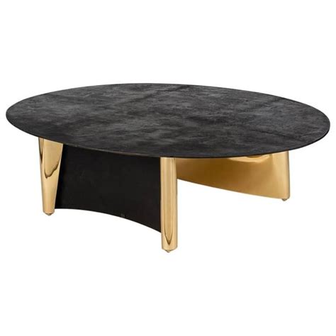 Rustic meets contemporary with this attractive coffee table design. Aline Hazarian, "Anahit" Contemporary Oval Coffee Table ...