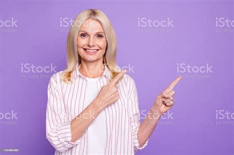 Photo Of Pretty Sweet Mature Woman Dressed Pink Shirt Pointing Two