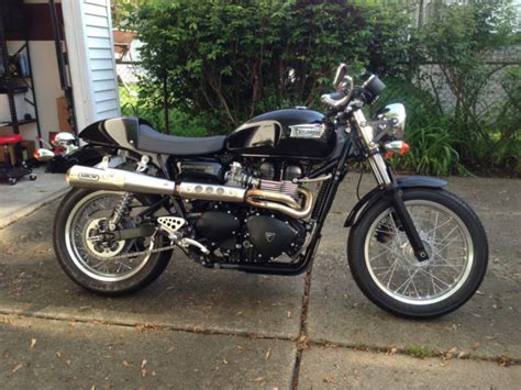 I've just bought a 2 into 1 exhaust which appears to be a tec, mostly because it was cheap. 2012 Triumph Thruxton Cafe Racer w/ Arrow Full Stainless 2 ...