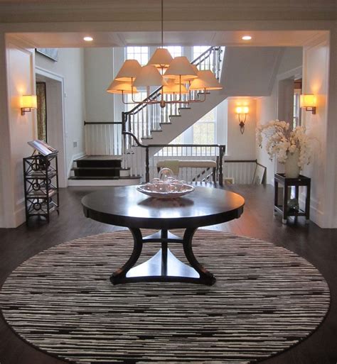 Elegant Round Foyer Table In Entry Traditional With Pedestal Table Next