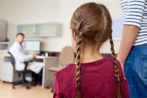 Scared Little Girl Entering Doctors Stock Photos Motion Array