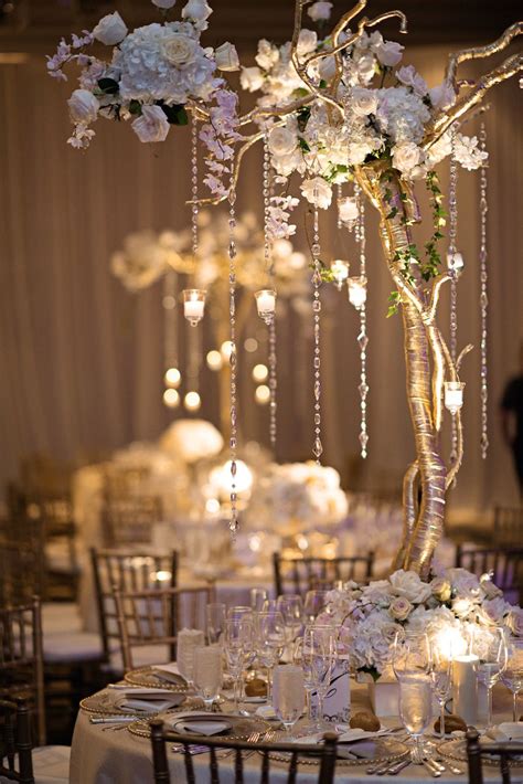 Guest Tables Were Decorated With Six Foot Tall Gilt Wrapped Trees Embellished With Romantic