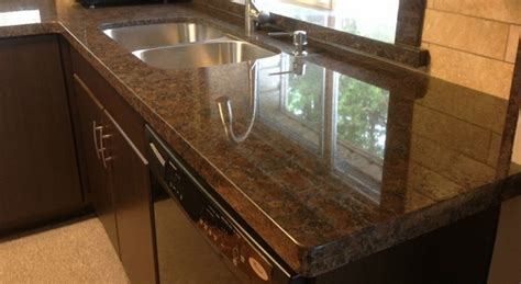Silestone alone has like 7 colors that could be characterized as dark brown, and they are all different. Coffee brown granite countertops - a variety of hues to ...