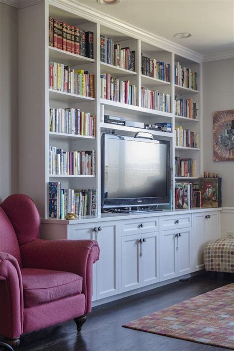 A Floor To Ceiling Built In Bookcase Is Both Practical And