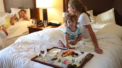 Mother With Daughter And Son In Hotel Room Stock Footage Video 13580753