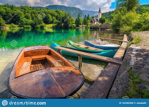 Spectacular Alpine Lake And Colorful Canoes Lake Bohinj Slovenia