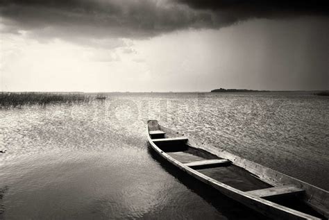 Lonely Boat On Lake Stock Image Colourbox