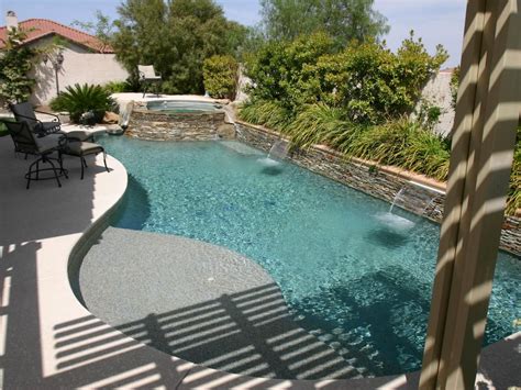 Curved Pool With Double Spillways And Raised Hot Tub Swimming Pool