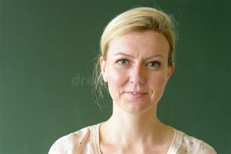 Female Teacher In Class In Front Of A Chalkboard Stock Photo Image Of