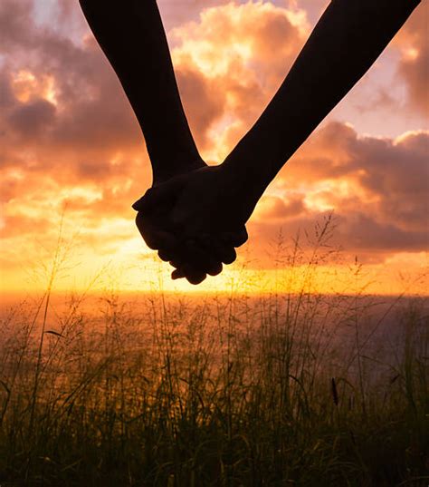Best Couple Holding Hands Stock Photos Pictures And Royalty Free Images