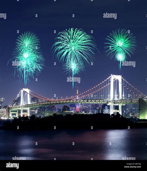 Fireworks Celebrating Over Tokyo Rainbow Bridge At Night Odaiba Japan