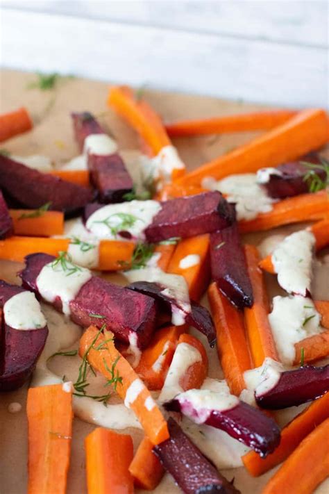 Roasted Beets And Carrots With Creamy Garlic Dill Sauce Being Nutritious