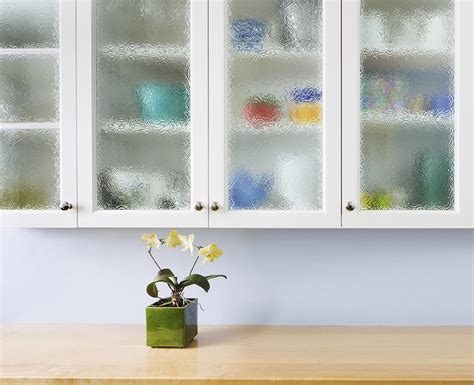Product photography and illustrations have been reproduced as accurately as print and web technologies permit. Replace or Reface: The Case for Kitchen Cabinet Refacing