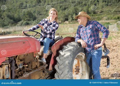 Woman Working On Small Farm Tractor Stock Photo Image Of Agricultural