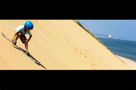 Sandboarding Or Sandsliding At The Tottori Sand Dunes