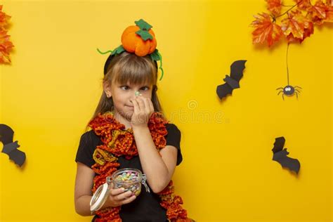 Little Girl Eating Candies For Halloween Stock Image Image Of