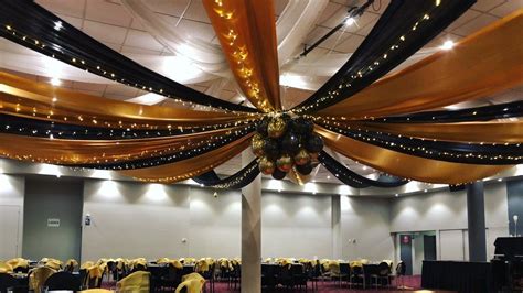 Black And Gold Silk Drapes With Fairy Lights And Balloon Centre By