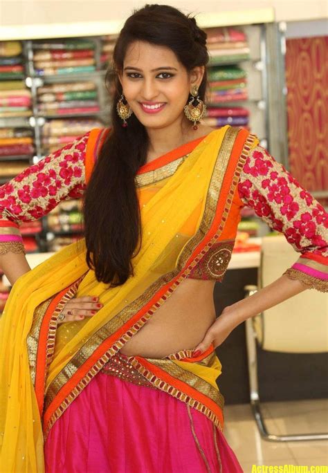 Next actress hema jelloju low hip saree navel show photos. Shweta Jadhav Navel Show In Yellow Half Saree - Actress Album