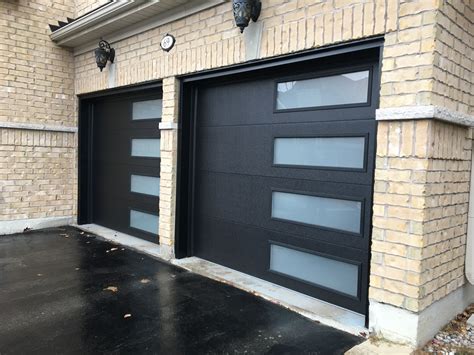 Jet Black Steel Garage Doors Have An Impressive Design With Color And