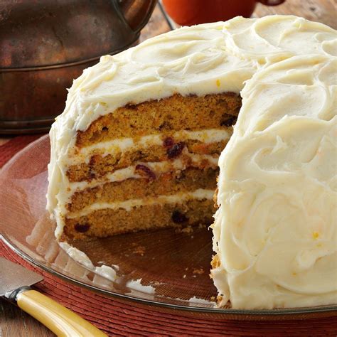 A simple, spiced carrot full of flavour and topped with moreish icing and chopped nuts. Cranberry-Carrot Layer Cake Recipe | Taste of Home