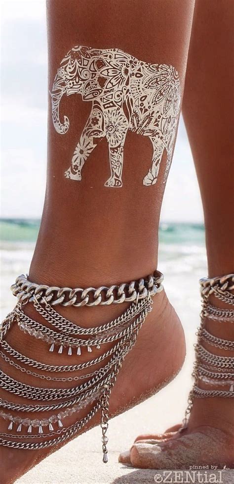 Maybe you would like to learn more about one of these? 40 Temporary Metallic Tattoos that are in Trend