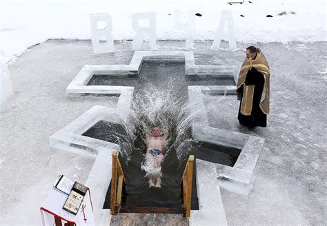 Epiphany Russian Orthodox Christians Plunge Into Frozen Rivers And Lakes To Celebrate