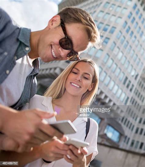 Exchanging Phone Numbers Photos And Premium High Res Pictures Getty