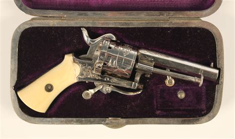 A Nickel Plated 7mm Pinfire Six Shot Open Frame Double Action Revolver