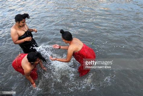nepalese hindu women take a ritual bath in the bagmati river during news photo getty images