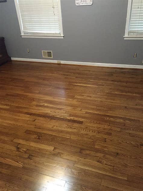 My contractor is putting in new red oak floor in my bedroom and refinishing the existing red oak floors in the living room/kitchen (its a small 650 sq ft apt). Early American Floor Stain - The Arts