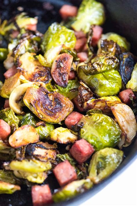 How do you roast brussel sprouts in the oven? Garlic Roasted Brussels Sprouts with Ham