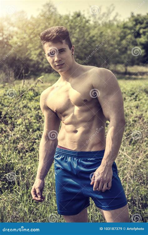 Young Muscular Shirtless Hunk Man Outdoor In Nature Royalty Free Stock