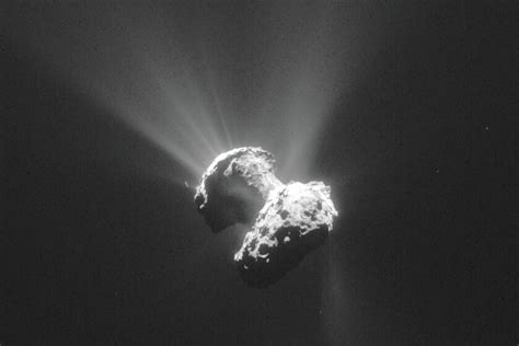 Astro Bob Blog Rosetta Spies Shiny Ice And Giant Sinkholes On Comet