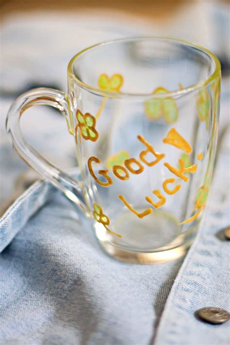 That means you've got some shopping to do! Hand painted mug 'Good luck!' with golden clover. Stained ...