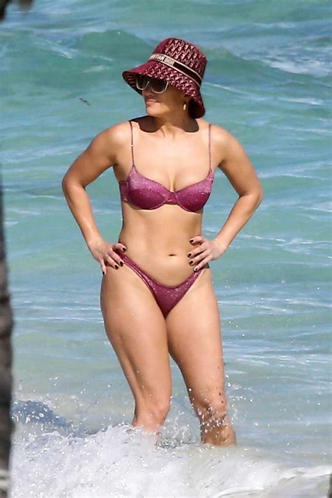Jennifer Lopez Shows Off Her Incredible Figure In A Pink Bikini While