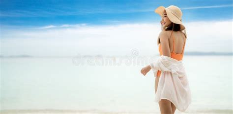 Asian Tourist Woman In Orange Bikini On The Beach Stock Image Image