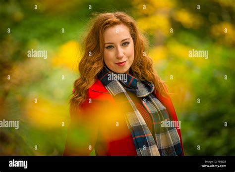 A Young Redhaired Redhead Red Haired Woman Alone Outdoors In Woodland