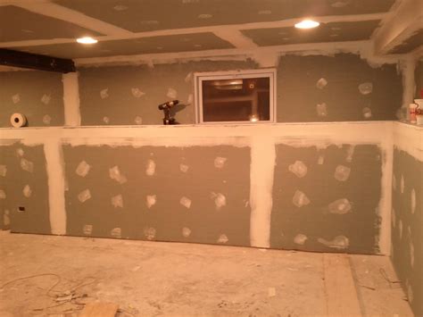 One of the biggest advantages to installing a drywall ceiling is that smooth, finished and home look that ceiling tiles just won't have. Second Coat - Basement Drywall Mud