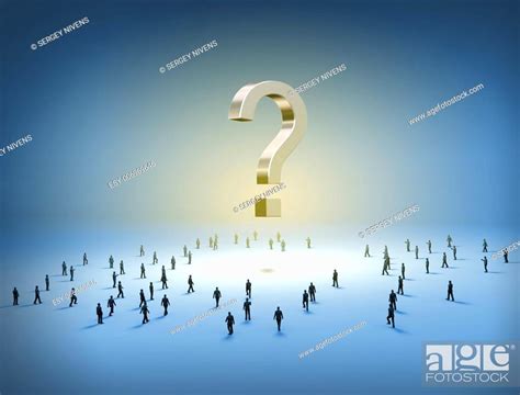 Group Of Tiny People Walking Towards A Question Mark Stock Photo