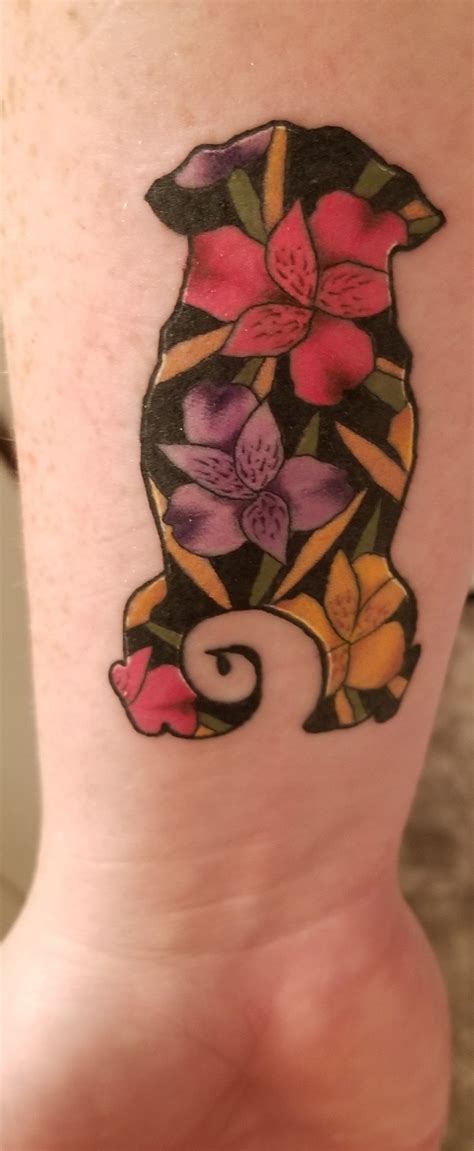 Wolf head with crossed arrows and a. Pug silhouette filled with flowers wrist tattoo! | Tattoos ...