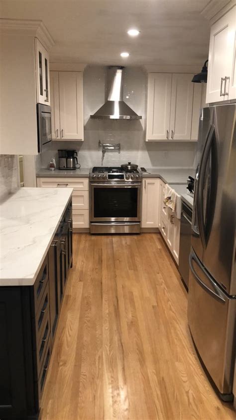 A bit more about pure white. Alabaster cabinets vlashing with white backsplash?