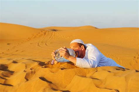 Premium Photo Portrait Of Thirsty Arabic Man On A Middle Of Yellow