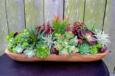 Depending on your style, space, place of living, or season there's a variety of. Long Faux Succulent Centerpiece Arrangement in Teak Wood ...