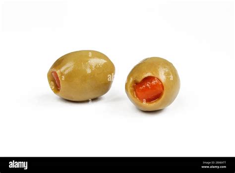Two Green Olives Stuffed With Red Pepper Wet Filled Olives Isolated