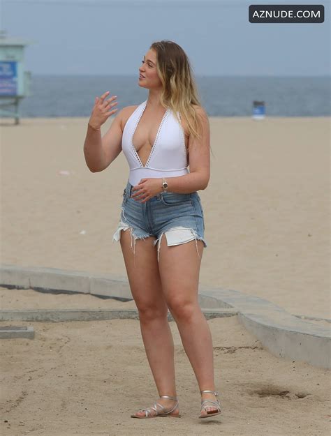 Iskra Lawrence Flashes Her Sideboob In White Swimsuit For Photoshoot On